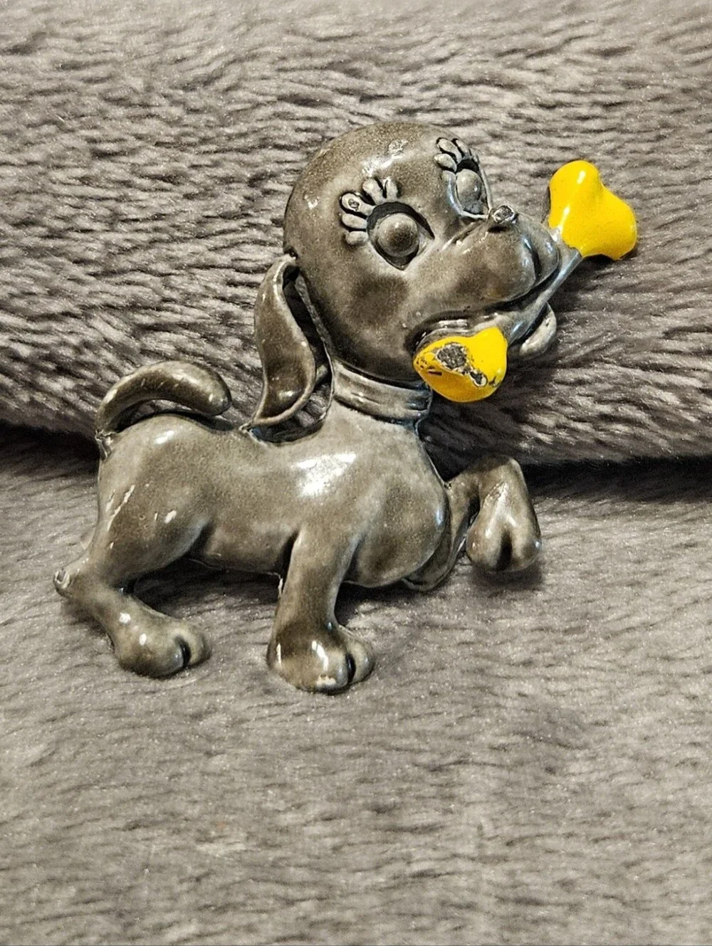 Vintage enamel brooch/pin - gray puppy holding a yellow bone.